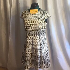 Beautiful cap sleeved dress black, cream, gold size 14 by SANDRA DARREN